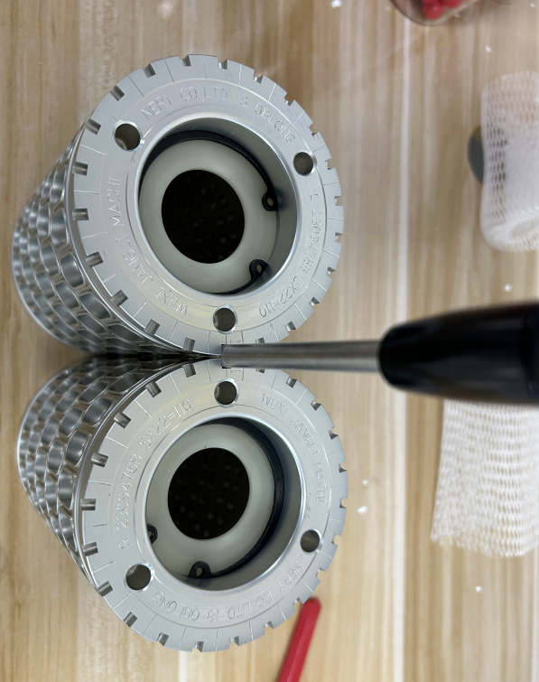 Softgel Die Roller Maintenance: How to Prevent Corrosion, Dents and Wear 6 Checking softgel die roller alignment with a matching detection tool, view 2